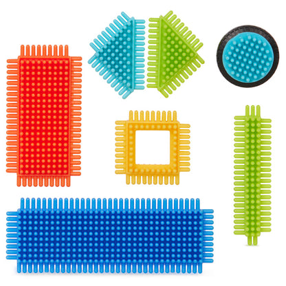 Creations made with Bristle Blocks, including a car with functional wheels.
