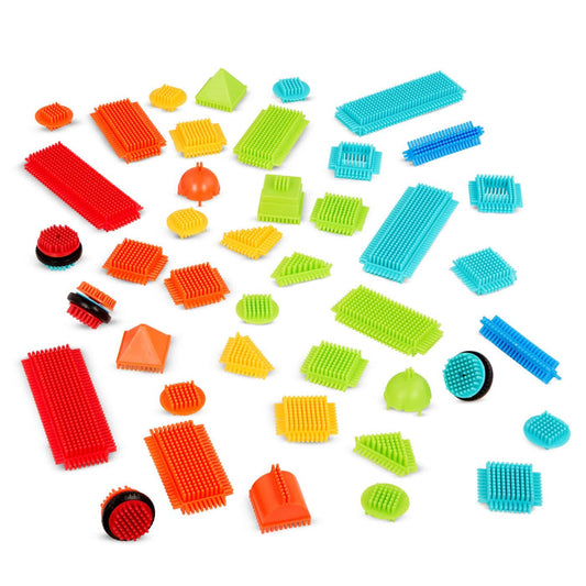 Colorful building blocks laid out, so you can see all the pieces.