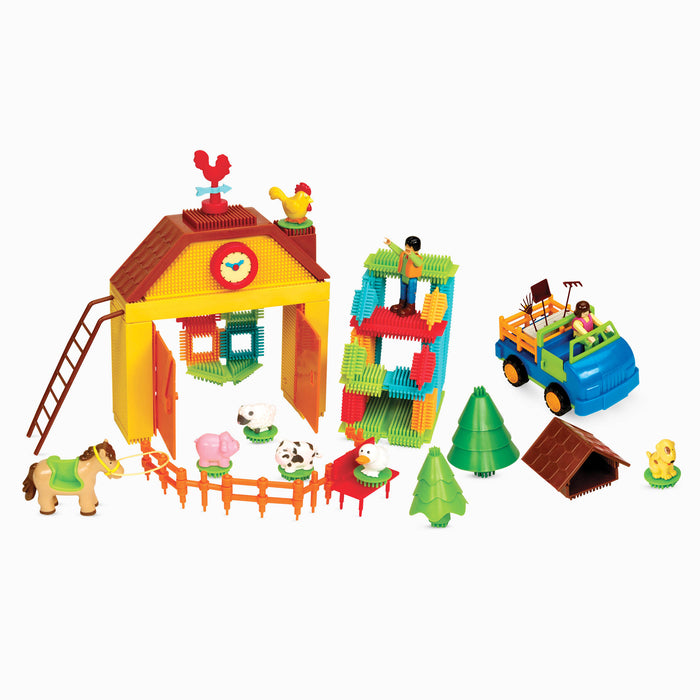 A 67-piece building block set with a farm theme, the set is laid out to show all the pieces, including animals, trees, and tractor.