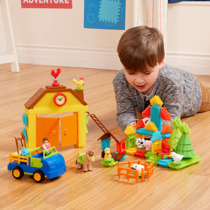 A 67-piece building block set with a farm theme, the set is laid out to show all the pieces, including animals, trees, and tractor.