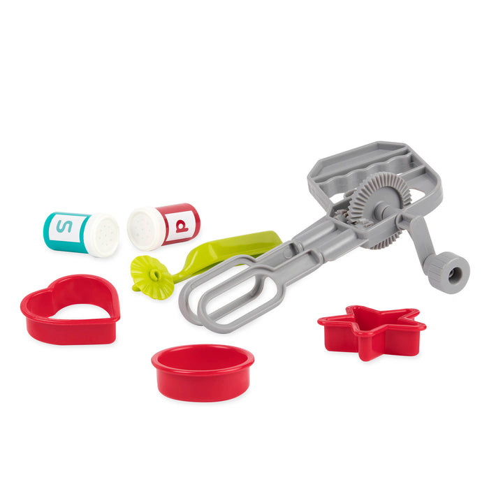 A toy cooking set with a huge variety of different tools in a green bin.
