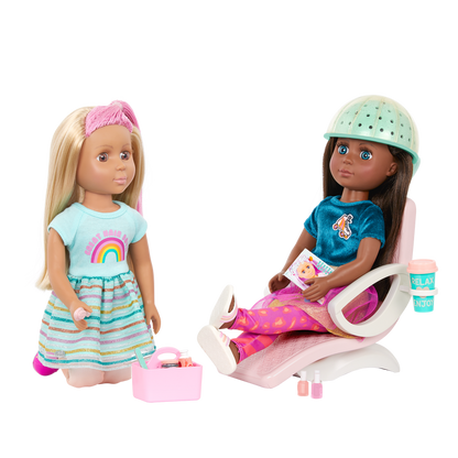 Two 14-inch dolls with salon chair and spa accessories
