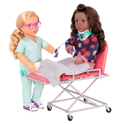 Two 18-inch dolls using ambulance gurney