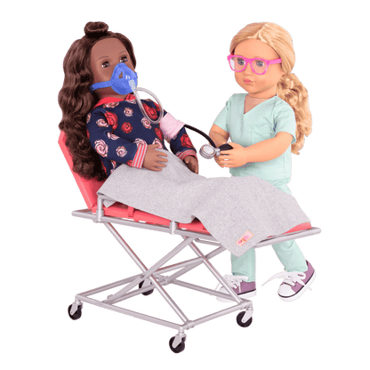 Two 18-inch dolls using ambulance gurney