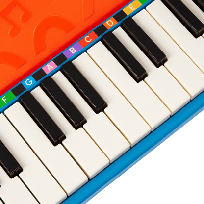 Toy piano and songsheet
