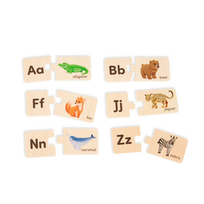 Puzzle pieces in a wooden box.