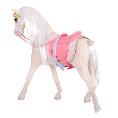 Beige and silver horse with saddle and accessories
