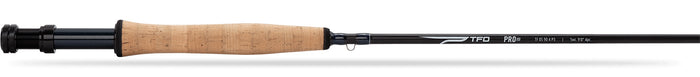 Fishing rod with cork handle and black grip on a white background
