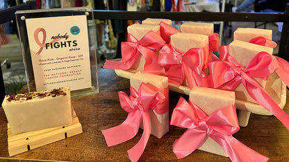 Think Pink Organic Soap wrapped in big pink bow on shelf