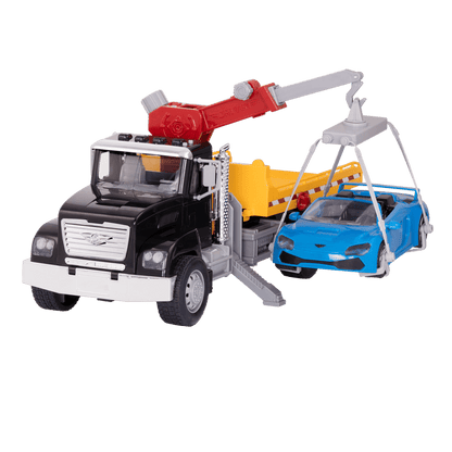 Black toy tow truck towing blue car