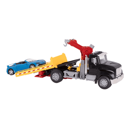Black toy tow truck towing blue car
