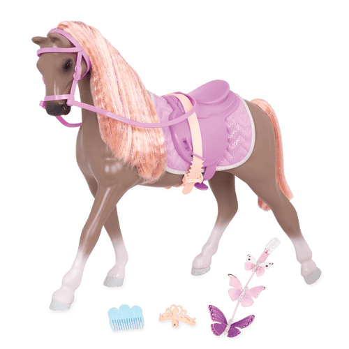 Light brown and peach horse with saddle and accessories